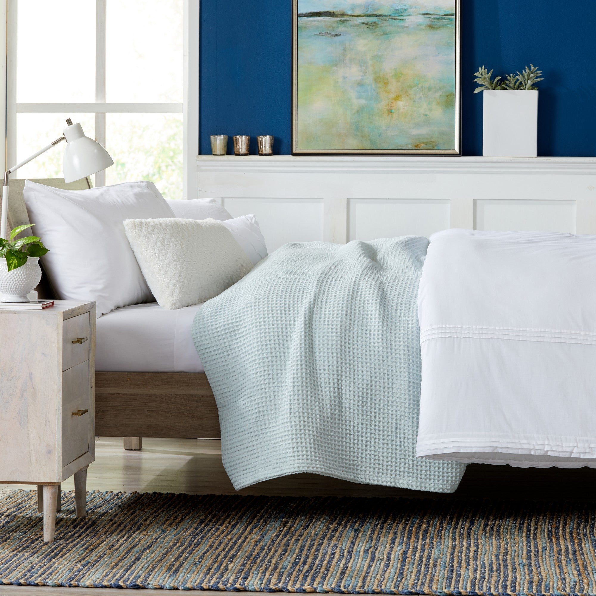 Brielle Collection Cotton Waffle Blanket by Market & Place featuring soft, breathable 100% cotton construction with a classic waffle weave texture. Available in multiple colors and shown folded, layered on beds, and in detailed fabric close-ups, highlighting its lightweight comfort and versatile year-round style.