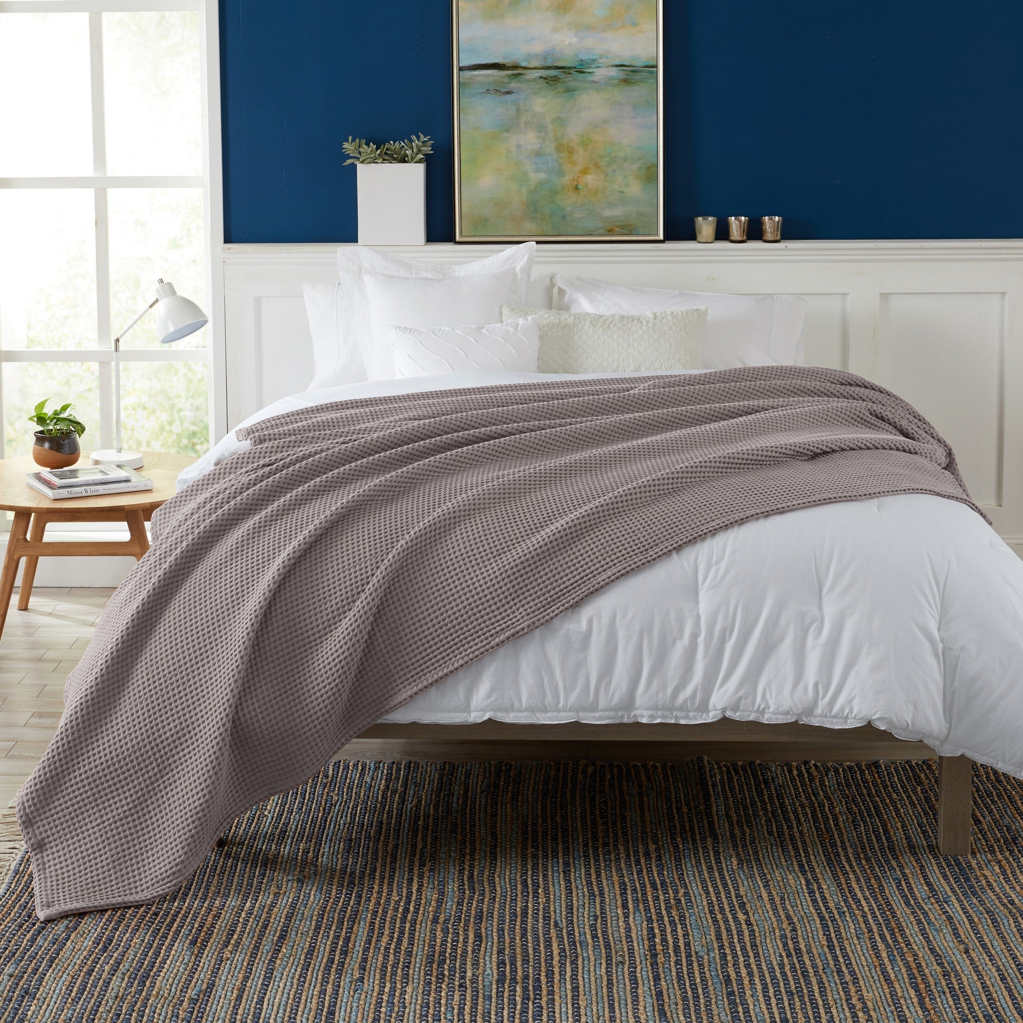 Brielle Collection Cotton Waffle Blanket by Market & Place featuring soft, breathable 100% cotton construction with a classic waffle weave texture. Available in multiple colors and shown folded, layered on beds, and in detailed fabric close-ups, highlighting its lightweight comfort and versatile year-round style.