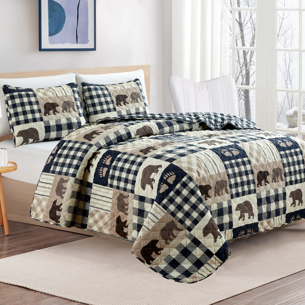Orson Collection Lodge Quilt Set by Market & Place featuring soft microfiber construction and rustic lodge-inspired patchwork designs with plaid patterns and wildlife motifs. Coordinating shams and detailed fabric close-ups are shown in cozy bedroom settings, highlighting the reversible design and year-round comfort.
