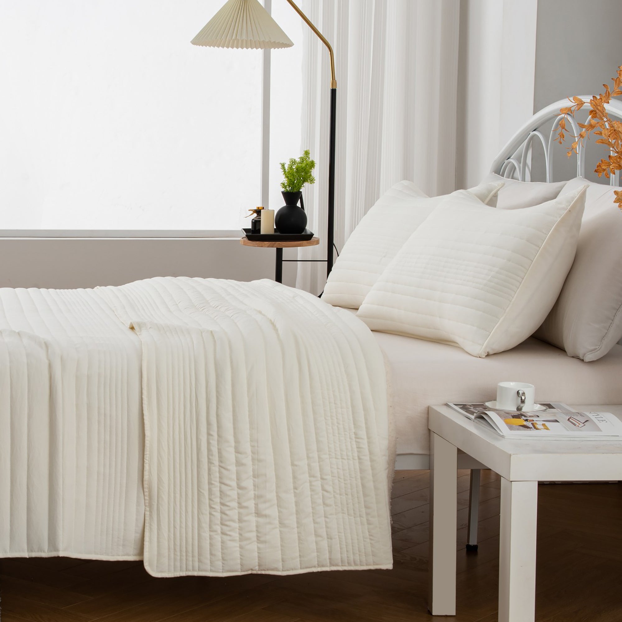 Parker Collection Solid Embroidered Quilt Set by Market & Place featuring soft microfiber construction and elegant channel embroidery. Available in multiple colors with coordinating shams and detailed fabric close-ups, styled in a modern bedroom setting.