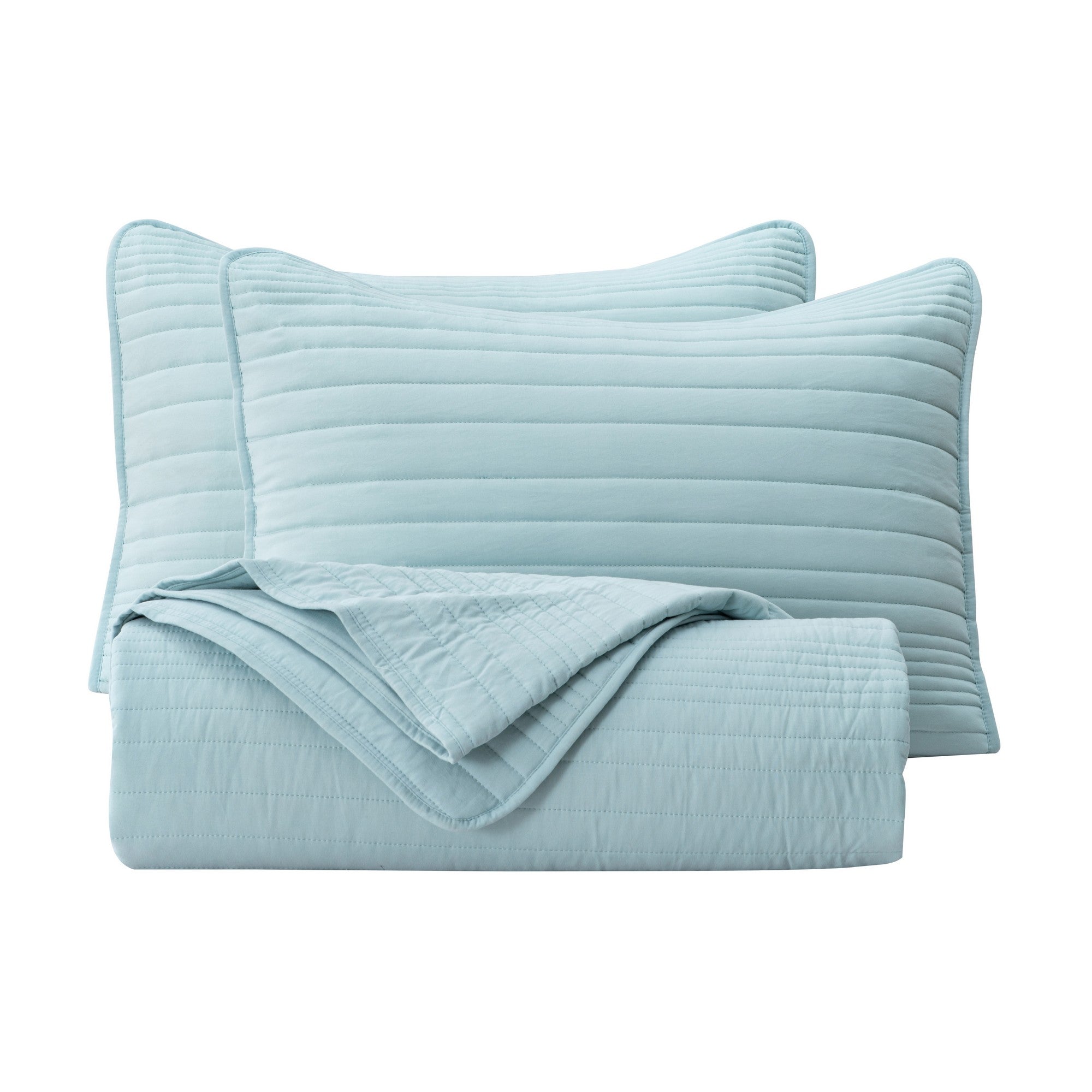 Parker Collection Solid Embroidered Quilt Set by Market & Place featuring soft microfiber construction and elegant channel embroidery. Available in multiple colors with coordinating shams and detailed fabric close-ups, styled in a modern bedroom setting.