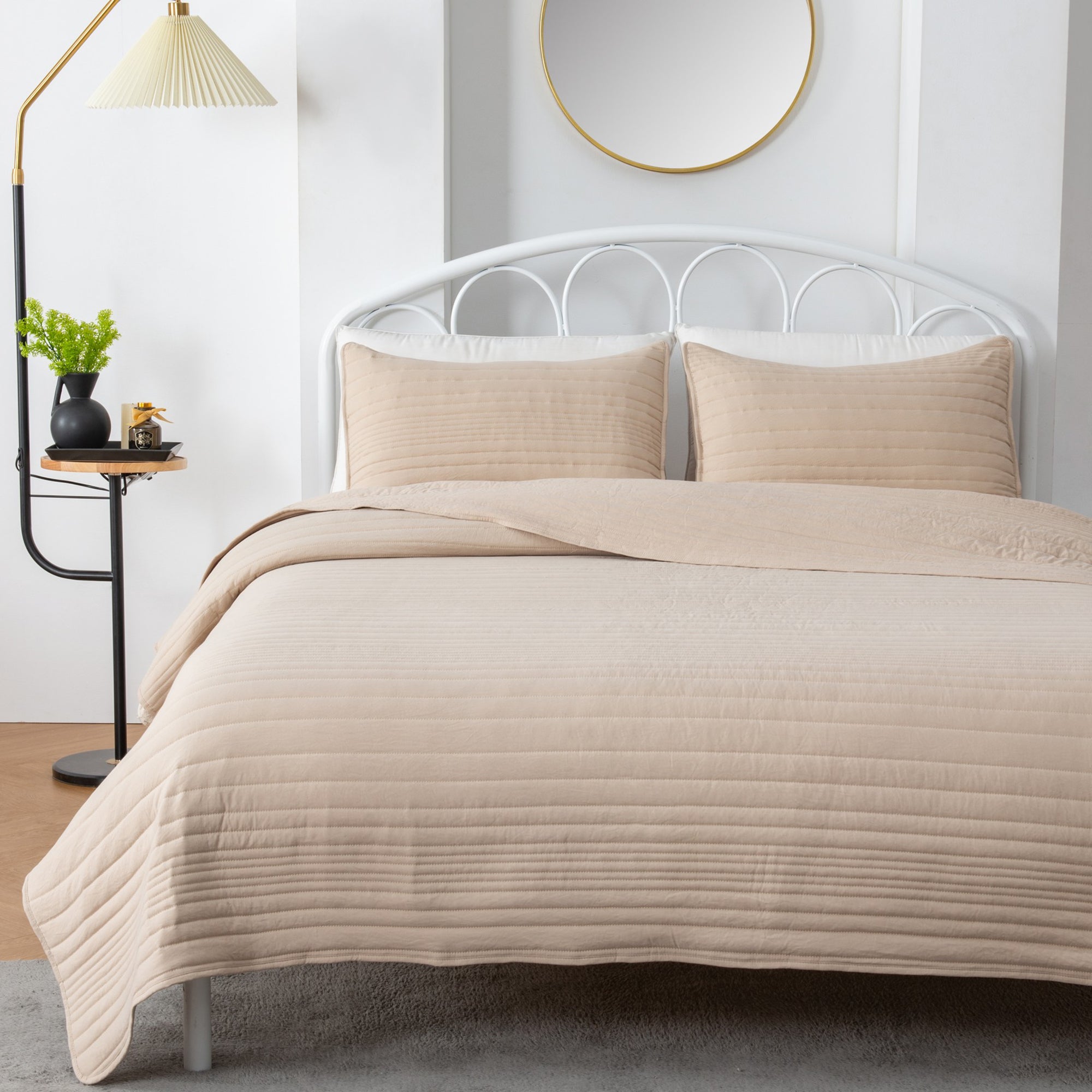 Parker Collection Solid Embroidered Quilt Set by Market & Place featuring soft microfiber construction and elegant channel embroidery. Available in multiple colors with coordinating shams and detailed fabric close-ups, styled in a modern bedroom setting.