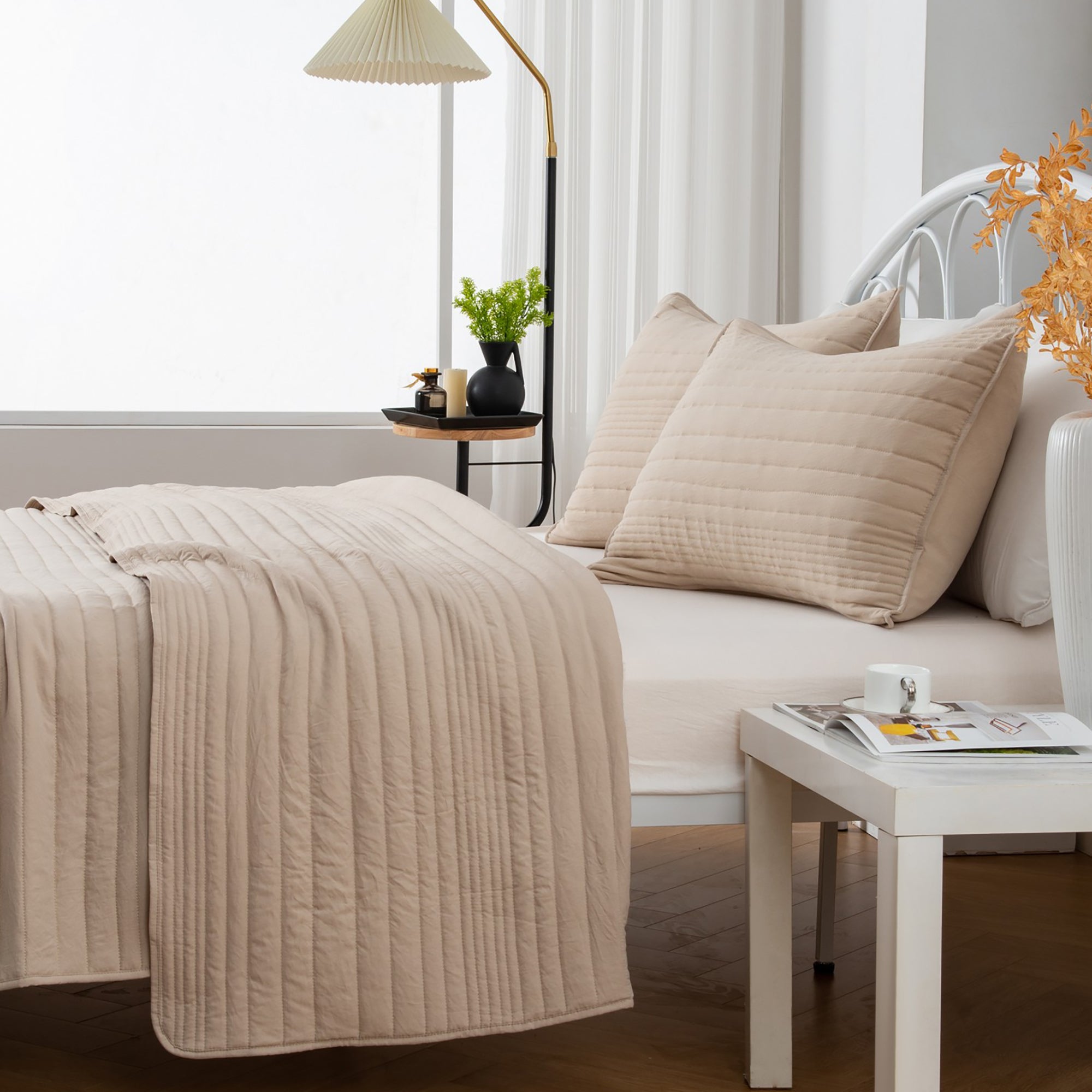 Parker Collection Solid Embroidered Quilt Set by Market & Place featuring soft microfiber construction and elegant channel embroidery. Available in multiple colors with coordinating shams and detailed fabric close-ups, styled in a modern bedroom setting.