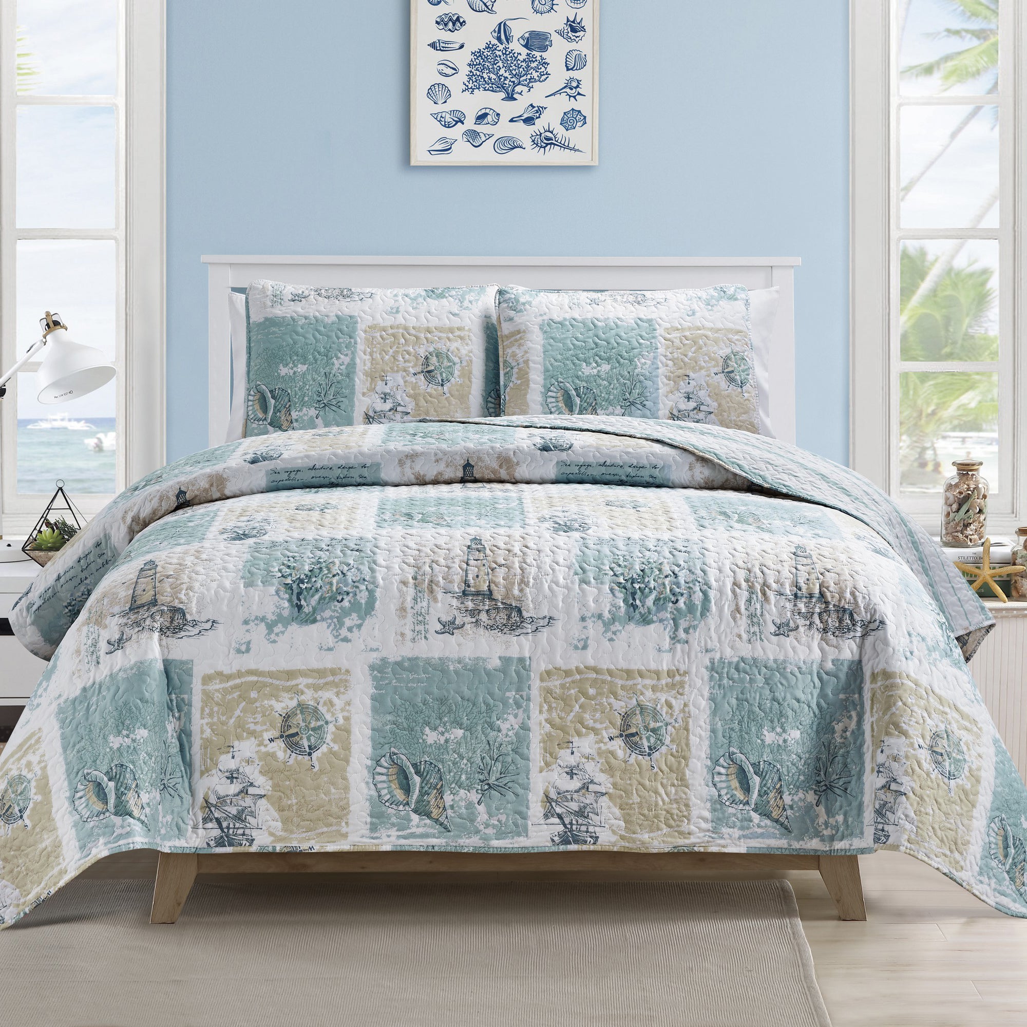 Coastal Collection Reversible Quilt Set by Market & Place featuring soft microfiber construction and coastal-inspired prints, including seashells, starfish, seahorses, coral, and ocean motifs. Coordinating shams and detailed fabric close-ups are shown in a bright bedroom setting, highlighting the reversible design and all-season comfort.